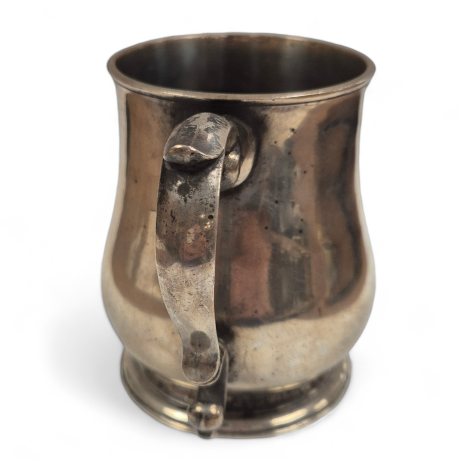 A George V silver baluster mug, Goldsmiths & Silversmiths Co Ltd, London, 1917, height 92mm, 8.8oz. Condition - poor to fair